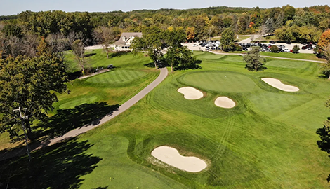Aerial view of bunkers and cart path on golf course